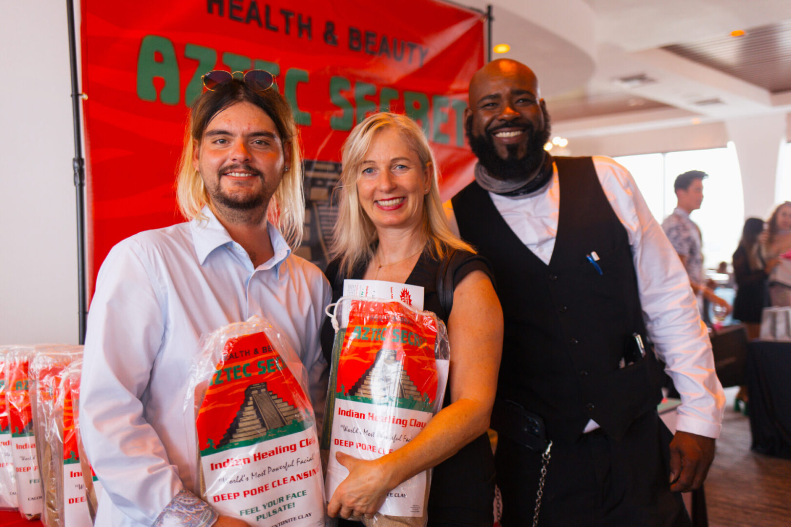 A woman posing for a picture with the Indian healthy clay kit | Aztec Secret Health & Beauty LTD